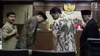 Menteri Agama Lukman Hakim Syaifuddin (kedua kiri) bersama mantan Ketua Umum PPP Romahurmuziy usai mengucapkan sumpah sebagai saksi pada sidang lanjutan suap seleksi pengisian jabatan di Kementerian Agama, Pengadilan Tipikor, Jakarta, Rabu (26/6/2019). (Liputan6.com/Helmi Fithriansyah)