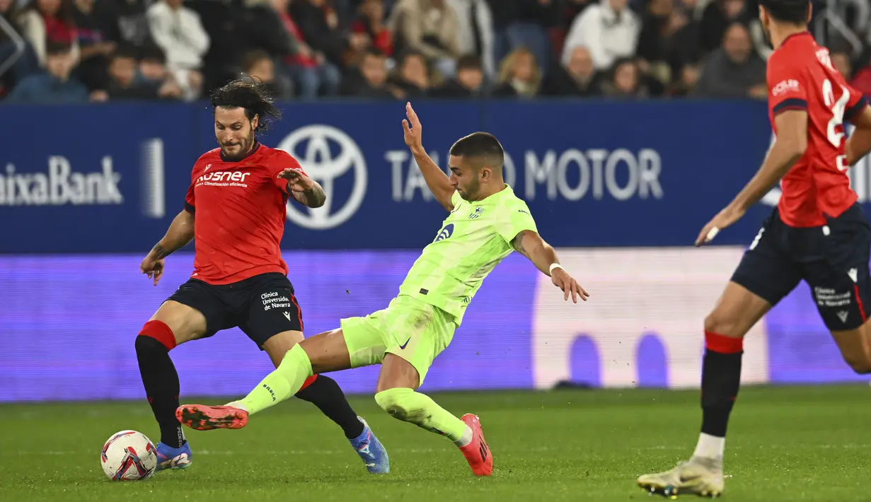 Hasil ini jadi kekalahan pertama Barcelona di liga sekaligus kekalahan pertama Hansi Flick di liga. Barcelona masih di puncak klasemen sementara dengan 21 poin. (AP Photo/Miguel Oses)