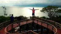 Wisatawan dapat menikmati pesona Tangga Bali di Desa Botu Barani, Kecamatan Kabila Bone, Kabupaten Bone Bolango, Gorontalo. (Liputan6.com/Aldiansyah M Fahrurozy)