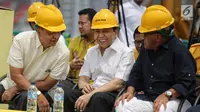 Senyuman Setya Novanto di peresmian pembangunan Gedung Panca Bakti DPP Golkar di Jakarta, Minggu (12/11). (Liputan6.com/Faizal Fanani)