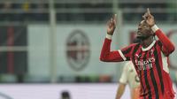 Ekspresi Tammy Abraham usai cetak gol dalam laga AC Milan vs AS Roma di perempat final Coppa Italia 2024/25 (c) AP Photo/Antonio Calanni
