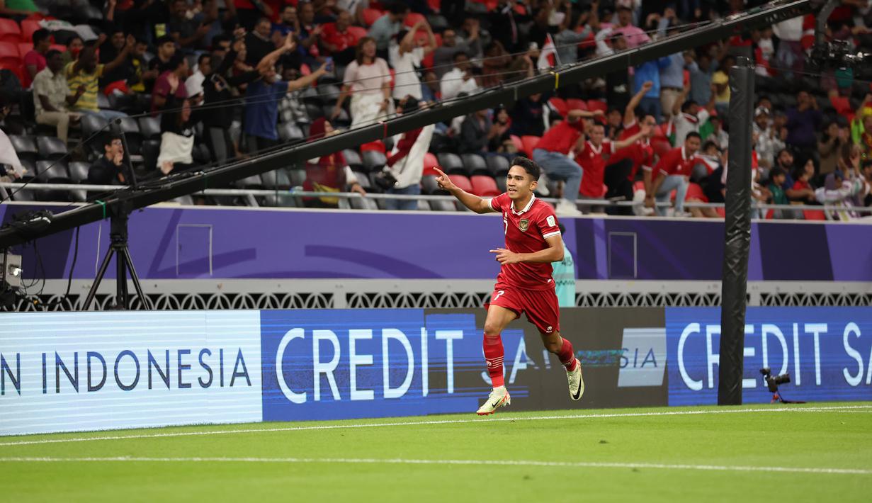 <p>Selebrasi gelandang Timnas Indonesia, Marselino Ferdinan setelah mencetak gol penyeimbang 1-1 ke gawang Timnas Irak pada laga pertama Grup D Piala Asia 2023 Qatar di Ahmad bin Ali Stadium, Al-Rayyan, Doha, Senin (15/1/2024). (Dok. PSSI)</p>