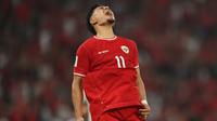 Reaksi kecewa pemain Timnas Indonesia, Ragnar Oratmangoen setelah gagal memaksimalkan peluang saat menghadapi Irak pada laga Grup F putaran kedua Kualifikasi Piala Dunia 2026 zona Asia antara Timnas Indonesia menghadapi Irak di Stadion Utama Gelora Bung Karno (SUGBK), Senayan, Jakarta, Kamis (6/6/2024). (Bola.com/M Iqbal Ichsan)