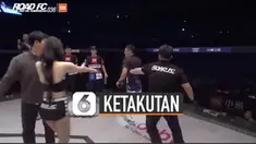 Sang atlet terus menjauh ketika sang gadis mengejar untuk membujuk.