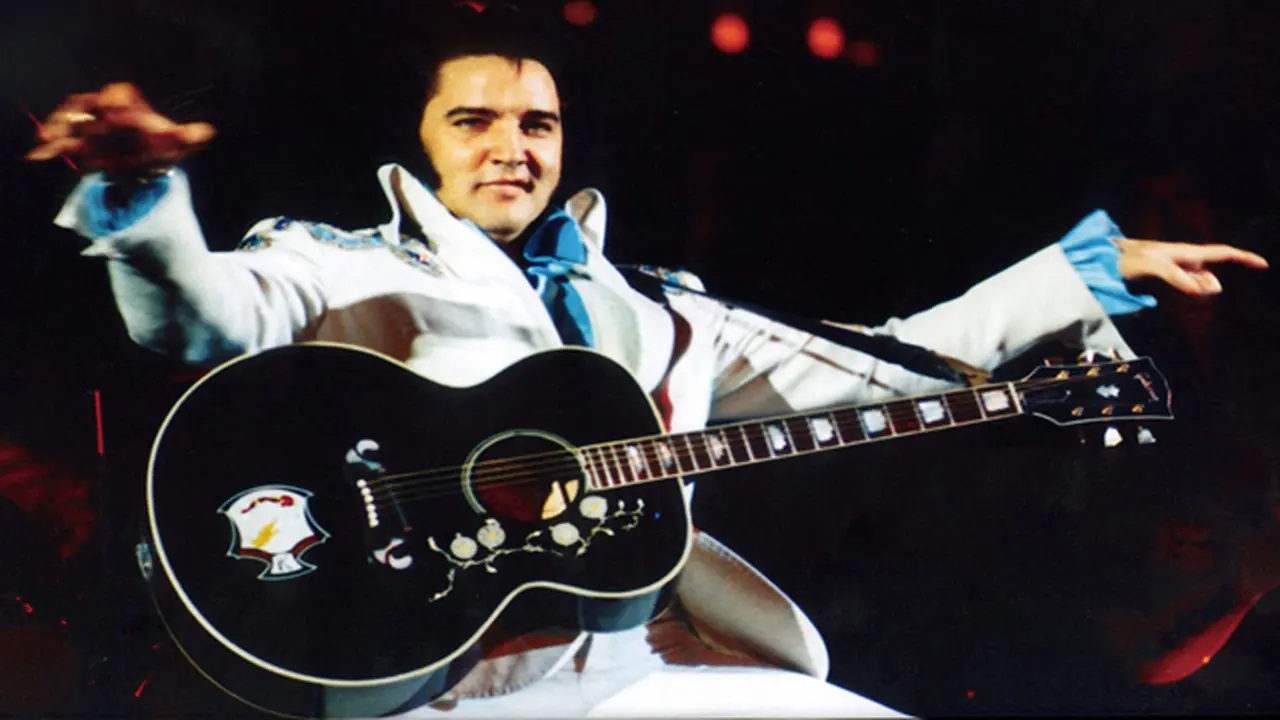 Demi Cetak Rekor, Pria Ini Jual Gitar Pemberian Elvis Presley 