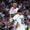 Pemain Real Madrid, Kylian Mbappe dan Alvaro Carreras, merayakan gol ke gawang Rayo Vallecano dalam lanjutan La Liga Spanyol di Santiago Bernabeu, Minggu (13/9/2026) dini hari WIB. (AP Photo/Manu Fernandez)