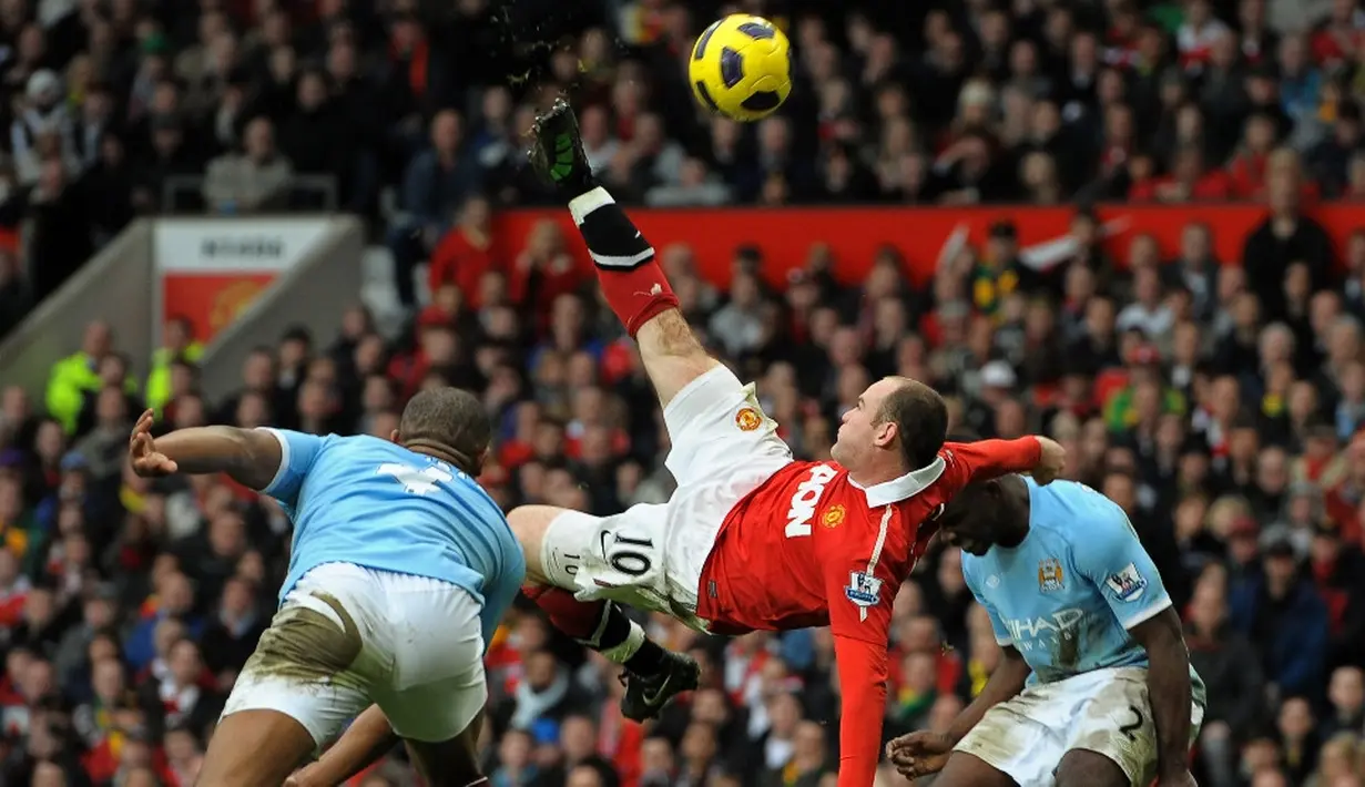 Rooney menjadi pemuncak daftar pencetak gol terbanyak pada laga antara Manchester United dan City. Sepanjang berseragam United, ia mencetak sebelas gol ke gawang City. (AFP/Andrew Yates)
