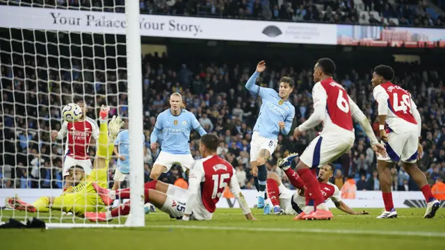 Foto: Melihat Gol Pamungkas John Stones yang Buyarkan Kemenangan di Depan Mata Arsenal Atas Manchester City