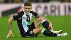 Newcastle United disingkirkan Cambridge United, klub Divisi 3 di Liga Inggris, di babak ketiga Piala FA 2021/2022, Sabtu (8/1/2022). Kekalahan tersebut juga mewarnai debut pahit Kieran Trippier yang baru didatangkan The Magpies dari klub Spanyol, Atletico Madrid. (AFP/Paul Ellis)