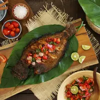 Ilustrasi ikan bakar./Copyright shutterstock.com/id/g/AriyaniTedjo
