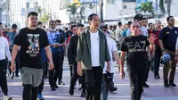 Presiden Joko Widodo atau Jokowi hadir di tengah-tengah masyarakat di acara CFD, kawasan Lapangan Merdeka Medan, Minggu (12/2/2023)