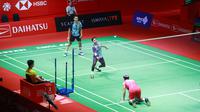 Pasangan ganda putra Indonesia, Fajar Alfian/Muhammad Rian Ardianto saat melawan sesama wakil Indonesia, Pramudya Kusumawardana/Yeremia Rambitan pada babak 32 besar Indonesia Masters 2023 di Istora Senayan, Jakarta, Selasa (24/1/2023). Fajar/Alfian menang dengan rubber game 18-21, 21-14 dan 21-10. (Bola.com/M Iqbal Ichsan)