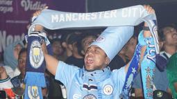 City sukses menaklukkan West Ham United dan sekaligus mengunci posisi puncak klasemen Premier League musim ini 91 poin. (Bola.com/Syahkist Afi Daib)