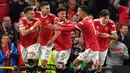 Sama seperti Juventus, Manchester United juga tersingkir di babak 16 besar. Setan Merah disingkirakan oleh Atletico Madrid dengan skor 1-2. Meskipun begitu, MU tetaplah menjadi salah satu penampil terbanyak di perempatfinal Liga Champions, yaitu 14 kali. (AFP/Anthony Devlin)