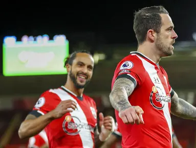 Penyerang Southampton, Danny Ings, melakukan selebrasi usai mencetak gol ke gawang Liverpool pada laga Liga Inggris di Stadion St Mary's, Selasa (05/01/2021). Liverpool takluk 1-0 dari Southampton. (AP/Noami Baker,Pool)
