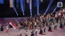 Pakaian adat membuka jalan kontingen Indonesia saat upacara pembukaan SEA Games 2019 di Philipine Arena Bulacan, Manila, Sabtu (30/11/2019). Pesta olahraga se-Asia Tenggara ini akan berlangsung hingga 11 Desember. (Bola.com/M Iqbal Ichsan)