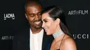 Cinta Kanye West untuk Kim Kardashian memang terlihat jelas. Keluarga mereka pun bisa dibilang harmonis. (REX/Shutterstock)