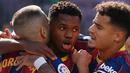 Ansu Fati berhasil menunjukkan kemampuannya ketika fase pembukaan musim 2020/2021 silam. Dirinya tercatat mencetak lima gol dan empat assist dalam 10 penampilan di La Liga dan Liga Champion. Saat ini, nilai banderolnya mencapai 60 juta Euro. (Foto: AFP/Lluis Gene)