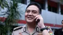 "Masih lama, bisa sampai malam," ucap salah satu petugas kepolisian di ruang Reserse Kriminal Khusus Polda Metro Jaya, Rabu (30/3/2016). (Nurwayunan/Bintang.com)