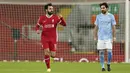 Penyerang Liverpool, Mohamed Salah berselebrasi usai mencetak gol ke gawang Manchester City pada pertandingan lanjutan Liga Inggris di Stadion Anfield, Inggris, Senin (8/2/2021). Hasil ini membuat posisi City kokoh di puncak klasemen sementara dengan 50 poin. (AP photo/Jon Super, Pool)