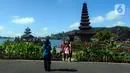 Pura Ulun Danu Beratan merupakan salah satu pura terbesar di Bali. Oleh sebab itu, banyak pengunjung yang datang ke pura tersebut untuk melihat keindahannya. (merdeka.com/Arie Basuki)