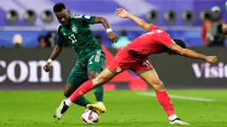 Oman sempat memimpin pada babak pertama berkat gol yang dicetak oleh Salaah Al-Yahyaei. Namun skuad Arab Saudi asuhan Roberto Mancini tersebut berhasil bangkit di babak kedua dan menyamakan kedudukan melalui Abdulrahman Ghareeb. (AP Photo/Aijaz Rahi)