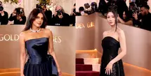 Salah satu yang paling menyita sorotan adalah Priyanka Chopra-Jonas. Ia tampil anggun dalam bustier satin navy berpotongan drapery yang dipadukan dengan rok sutra navy mengalir. Look ini menonjolkan kekuatan struktur khas couture Dior dengan sentuhan sensual yang refined. [Dok/DIOR].