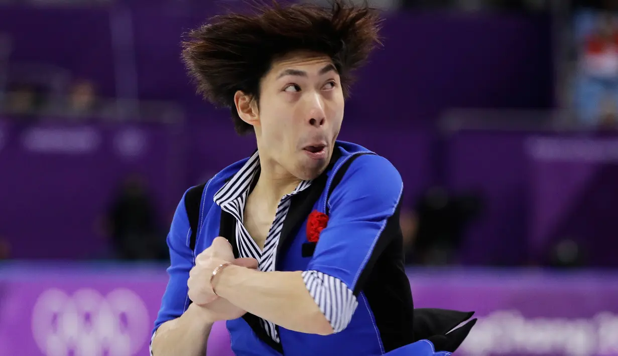 Ekspresi atlet figure skating dari Jepang, Keiji Tanaka saat berlaga di final Olimpiade Musim Dingin 2018 di Gangneung Ice Arena, Korea Selatan (17/2). (AP Photo / David J. Phillip)