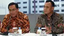 Ketua BPK Agung Firman Sampurna (kiri) bersama Ketua KPK Firli Bahuri memberi keterangan usai menggelar pertemuan di Gedung BPK, Jakarta, Selasa (7/1/2020). BPK dan KPK menyepakati kerja sama tindak lanjut hasil pemeriksaan yang berindikasi kerugian negara dan unsur pidana. (Liputan6.com/JohanTallo)