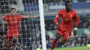 9. Sadio Mane (Liverpool) - 9 Gol. (AFP/Oli Scarff)