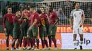 Seleccao das Quinas yang tidak diperkuat Cristiano Ronaldo karena sedang sakit tetap menunjukkan penampilan terbaiknya. Portugal menang dengan skor telak empat gol tanpa balas atas Nigeria. (AP/Armando Franca)