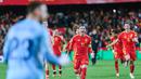 Para pemain Timnas Spanyol merayakan kemenangan atas Belanda pada laga leg kedua perempat final UEFA Nations League di Mestalla, Valencia, Senin (24/03/2025) dini hari WIB. (AP Photo/Alberto Saiz)