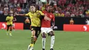 Dibabak kedua, Manchester United menyamakan skor menjadi 2-2, namun Dortmund kembali memimpin 2-3 pada menit ke-71. (Candice Ward/Getty Images/AFP)