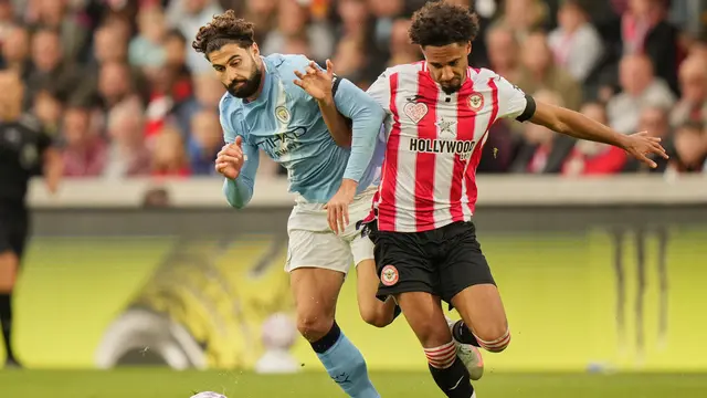 Duel Brentford vs Manchester City di pekan ke tujuh Liga Inggris 2025/2026 di Gtech Community Stadium, Minggu (05/10/2025). (AP Photo/Alastair Grant)