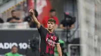 Gelandang AC Milan, Brahim Diaz berselebrasi usai mencetak gol ke gawang Udinese pada pertandingan Liga Serie A Italia di stadion San Siro, di Milan, Italia, Sabtu (13/8/2022). AC Milan menang atas Udinese 4-2. (AP Photo/Antonio Calanni)