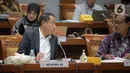 Menpora Zainudin Amali berbincang disela rapat kerja dengan Komisi X DPR di Kompleks Parlemen, Senayan, Jakarta, Selasa (31/1/2023). Rapat membahas mengenai evaluasi program kerja dan anggaran tahun 2022, persiapan pelaksanaan program kerja tahun 2023, serta program anggaran Kemenpora sesuai struktur organisasi baru. (Liputan6.com/Faizal Fanani)