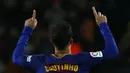 Pemain FC Barcelona, Coutinho merayakan gol usai membobol gawang Girona pada La Liga Santander di Camp Nou stadium, Barcelona, (24/2/2018). Barcelona menang telak 6-1. (AP/Manu Fernandez)