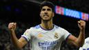 Rekan Benzema, Marco Asensio juga berhasil menorehkan namanya di daftar pencetak hattrick Liga Spanyol pada musim ini. Asensio melakukan hal tersebut saat Real Madrid pesta 6-1 ke gawang Real Mallorca pada pekan keenam. (AFP/Oscar Del Pozo)