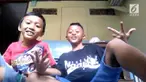 Sebuah video merekam aksi dua bocah yang gunakan susu kental manis sebagai pomade di rambutnya.