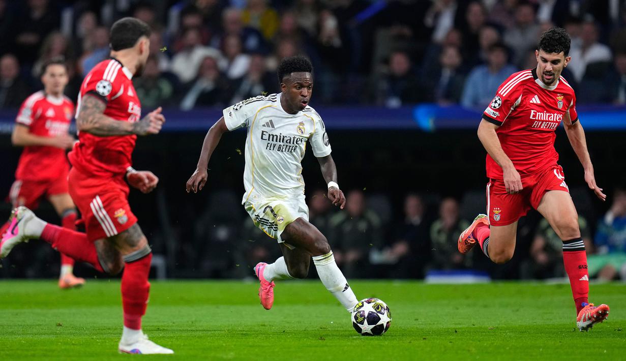 Pada leg pertama, Vinicius juga menjadi kunci kesuksesan Los Blancos dalam laga penuh tensi di kandang Benfica, Estadio Da Luz. (AP Photo/Manu Fernandez)