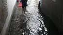 Hujan yang melanda wilayah DKI Jakarta dan sekitarnya pada Rabu (31/1/2024) menyebabkan kenaikan status di sejumlah pintu air. (merdeka.com/imam Buhori)