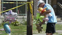 Kebakaran menghanguskan tempat penitipan anak atau daycare di Erie, Pennsylvania. (Greg Wohlford/Erie Times-News via AP)