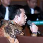 Terdakwa korupsi proyek e-KTP, Setya Novanto menjawab pertanyaan usai mendengar pembacaan putusan di Pengadilan Tipikor, Jakarta, Selasa (24/4). Setya Novanto divonis hukuman 15 tahun penjara dan denda Rp 500 juta. (Liputan6.com/Helmi Fithriansyah)