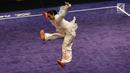 Atlet Timnas Wushu Indonesia Lindswell Kwok saat berlaga dalam pertandingan wushu nomor Tajijian putri di Kuala Lumpur Convention Centre Hall 5, Kuala Lumpur, Malaysia, Selasa (21/8). Lindswell meraih skor 9,68. (Liputan6.com/Faizal Fanani)