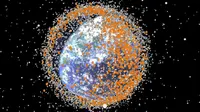 Ilustrasi sampah antariksa yang ada di sekitar orbit bumi (sumber: mirror.com)