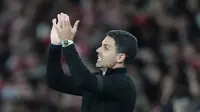Wajah bahagia terpancar dari Mikel Arteta setelah Arsenal berhasil meraih kemenangan penting saat menjamu Burnley dalam lanjutan Premier League 2025/2026. Bermain di Emirates Stadium, Selasa (19/5/2026) dini hari WIB, The Gunners menang tipis 1-0 lewat gol Kai Havertz. (AP Photo/Kirsty Wigglesworth)