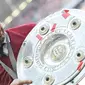 9. Kembali Josep Guardiola membuktikan tajinya, kali ini giliran Bayern Munchen yang dibawanya menjadi juara liga. Petualangan Pep di Jerman berbuah manis. (AFP/Angelika Warmuth)