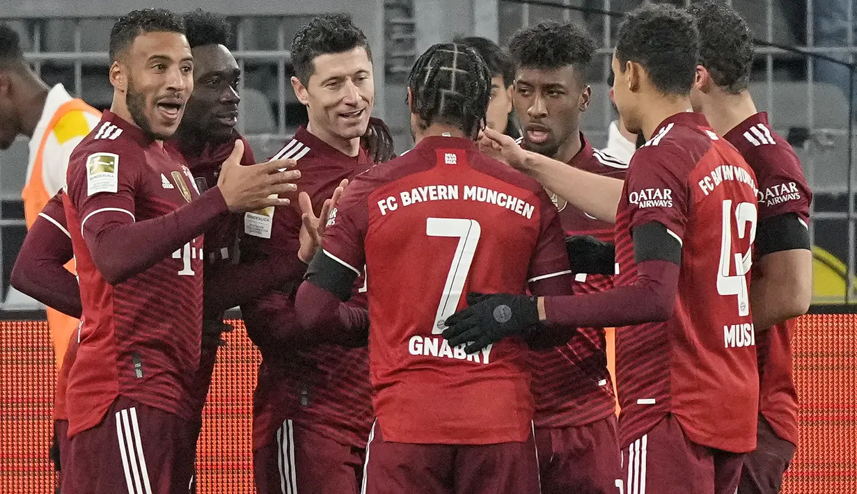 Sementara dari kubu Die Roten ada nama Robert Lewandowski yang memborong dua gol dan satu gol lainnya dicetak Kingsley Coman. (AP/Martin Meissner)