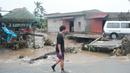 Banjir bandang terjadi setelah Badai Tropis Trami, yang secara lokal dinamai Kristine, menurunkan hujan lebat di kota Libon, provinsi Albay, Filipina. (AP Photo/John Michael Magdasoc)