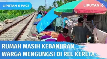 Rumah masih kebanjiran, ratusan warga korban banjir Serang terpaksa mengungsi di jalur rel kereta api. Ketika ada kereta api melintas, mereka lari berhamburan menepi di pinggir rel.